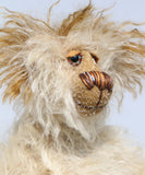 Lumbley is an endearingly sweet and gentle, beautifully coloured, one of a kind,  artist bear by Barbara-Ann Bears, Lumbley stands 10 inches/ 25 cm tall. e's made from cream coloured mohair which has a pale tan backcloth and he has a little mohawk on his head and fluffy ears.