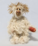 Lumbley is an endearingly sweet and gentle, beautifully coloured, one of a kind,  artist bear by Barbara-Ann Bears, Lumbley stands 10 inches/ 25 cm tall. e's made from cream coloured mohair which has a pale tan backcloth and he has a little mohawk on his head and fluffy ears.