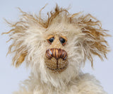 Lumbley is an endearingly sweet and gentle, beautifully coloured, one of a kind,  artist bear by Barbara-Ann Bears, Lumbley stands 10 inches/ 25 cm tall. e's made from cream coloured mohair which has a pale tan backcloth and he has a little mohawk on his head and fluffy ears.