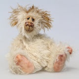 Lumbley is an endearingly sweet and gentle, beautifully coloured, one of a kind,  artist bear by Barbara-Ann Bears, Lumbley stands 10 inches/ 25 cm tall. e's made from cream coloured mohair which has a pale tan backcloth and he has a little mohawk on his head and fluffy ears.