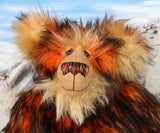 Marigold's face, close up. Showing her beautiful hand painted eyes, wonderful nose and sweet smile.
Marigold is a very large and beautifully coloured, one of a kind, artist bear by Barbara Ann Bears in luxurious fluffy black tipped orange faux fur and very long gold coloured mohair, she stands 24 inches/60 cm tall