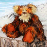 Marigold sitting.
Marigold is a very large and beautifully coloured, one of a kind, artist bear by Barbara Ann Bears in luxurious fluffy black tipped orange faux fur and very long gold coloured mohair, she stands 24 inches/60 cm tall