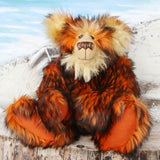 Marigold sitting.
Marigold is a very large and beautifully coloured, one of a kind, artist bear by Barbara Ann Bears in luxurious fluffy black tipped orange faux fur and very long gold coloured mohair, she stands 24 inches/60 cm tall