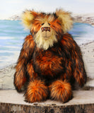 Marigold standing.
Marigold is a very large and beautifully coloured, one of a kind, artist bear by Barbara Ann Bears in luxurious fluffy black tipped orange faux fur and very long gold coloured mohair, she stands 24 inches/60 cm tall