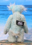 Perry is a gentle, happy teddy bear, a beautifully blue one of a kind, hand dyed mohair artist bear by Barbara-Ann Bears, he stands 9 inches/23 cm tall.   Perry is mainly made from a fairly short, sparse hand dyed sky blue, couple with a long fluffy white mohair with blue tipping and hand-dyed velvet paw pads.