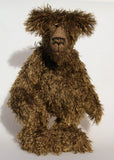 Murdo is a wild and handsome, one of a kind, artist bear by Barbara-Ann Bears in wonderful long and straggly mohair, he stands 18 inches/ 46cm tall.  Murdo is made from a long and wildly tousled, medium brown mohair, with hand painted glass eyes with eyelids, a wonderfully embroidered nose and an engaging smile.