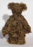 Murdo is a wild and handsome, one of a kind, artist bear by Barbara-Ann Bears in wonderful long and straggly mohair, he stands 18 inches/ 46cm tall.  Murdo is made from a long and wildly tousled, medium brown mohair, with hand painted glass eyes with eyelids, a wonderfully embroidered nose and an engaging smile.