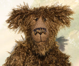 Murdo is a wild and handsome, one of a kind, artist bear by Barbara-Ann Bears in wonderful long and straggly mohair, he stands 18 inches/ 46cm tall.  Murdo is made from a long and wildly tousled, medium brown mohair, with hand painted glass eyes with eyelids, a wonderfully embroidered nose and an engaging smile.