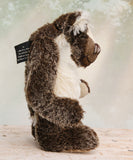 Nicholas Prickleless is a downbeat and curious one of a kind, mohair artist bear by Barbara-Ann Bears, he stands 9 inches/ 23 cm tall Nicholas Prickleless is mostly made from a dense, short dark brown mohair with white tipping, couple with a longer pale cream mohair, cream ultrasuede paws, hand painted eyes and a sweet smile