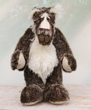 Nicholas Prickleless is a downbeat and curious one of a kind, mohair artist bear by Barbara-Ann Bears, he stands 9 inches/ 23 cm tall Nicholas Prickleless is mostly made from a dense, short dark brown mohair with white tipping, couple with a longer pale cream mohair, cream ultrasuede paws, hand painted eyes and a sweet smile