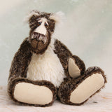 Nicholas Prickleless is a downbeat and curious one of a kind, mohair artist bear by Barbara-Ann Bears, he stands 9 inches/ 23 cm tall Nicholas Prickleless is mostly made from a dense, short dark brown mohair with white tipping, couple with a longer pale cream mohair, cream ultrasuede paws, hand painted eyes and a sweet smile