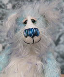 Perry has beautiful hand painted eyes with eyelids, a nose embroidered from individual threads to complement his colouring and he has a huge, friendly smile. Perry is mainly made from a fairly short, sparse hand dyed sky blue, couple with a long fluffy white mohair with blue tipping and hand-dyed velvet paw pads.