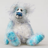 Perry is a gentle, happy teddy bear, a beautifully blue one of a kind, hand dyed mohair artist bear by Barbara-Ann Bears, he stands 9 inches/23 cm tall.   Perry is mainly made from a fairly short, sparse hand dyed sky blue, couple with a long fluffy white mohair with blue tipping and hand-dyed velvet paw pads.