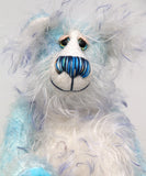 Perry has beautiful hand painted eyes with eyelids, a nose embroidered from individual threads to complement his colouring and he has a huge, friendly smile. Perry is mainly made from a fairly short, sparse hand dyed sky blue, couple with a long fluffy white mohair with blue tipping and hand-dyed velvet paw pads.