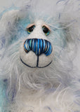 Perry has beautiful hand painted eyes with eyelids, a nose embroidered from individual threads to complement his colouring and he has a huge, friendly smile. Perry is mainly made from a fairly short, sparse hand dyed sky blue, couple with a long fluffy white mohair with blue tipping and hand-dyed velvet paw pads.