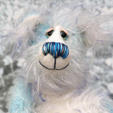 Perry has beautiful hand painted eyes with eyelids, a nose embroidered from individual threads to complement his colouring and he has a huge, friendly smile. Perry is mainly made from a fairly short, sparse hand dyed sky blue, couple with a long fluffy white mohair with blue tipping and hand-dyed velvet paw pads.