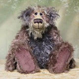 Priscilla Proon sitting. Priscilla Proon is a calm and thoughtful beautifully coloured one of a kind artist bear in gorgeous rose and grey hand dyed mohair by Barbara Ann Bears she stands 12 inches( 30cm) tall