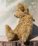 Walter is a large traditional one of a kind artist teddy bear in antique gold mohair by Barbara Ann Bears with an Edwardian collar he stands 21.5 inches/54cm tall. Walter has beige wool-felt paw pads, amber glass eyes, a neat hand embroidered nose and a sweet smile. Walter comes with an Edwardian style shirt collar and stud, but decided to take it off for this photo.