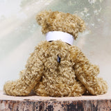 Walter is a large traditional one of a kind artist teddy bear in antique gold mohair by Barbara Ann Bears with an Edwardian collar he stands 21.5 inches/54cm tall. Walter has beige wool-felt paw pads, amber glass eyes, a neat hand embroidered nose and a sweet smile. Walter comes with an Edwardian style shirt collar and stud.