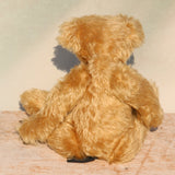 Wilfred is a very sweet and friendly artist teddy bear in gorgeous mohair by Barbara Ann Bears, he is 12 inches/30 cm tall and is 8.5 inches/21 cm sitting. Wilfred is made from a wonderful antique gold mohair with brown wool felt paw pads and gorgeous amber glass eyes. Wilfred has a carefully embroidered brown nose