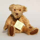 Wilfred is a very sweet and friendly artist teddy bear in gorgeous mohair by Barbara Ann Bears, he is 12 inches/30 cm tall and is 8.5 inches/21 cm sitting. Wilfred is made from a wonderful antique gold mohair with brown wool felt paw pads and gorgeous amber glass eyes. Wilfred has a carefully embroidered brown nose
