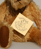 Wilfred is a very sweet and friendly artist teddy bear in gorgeous mohair by Barbara Ann Bears, he is 12 inches/30 cm tall and is 8.5 inches/21 cm sitting. Wilfred is made from a wonderful antique gold mohair with brown wool felt paw pads and gorgeous amber glass eyes. Wilfred has a carefully embroidered brown nose