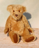 Wilfred is a very sweet and friendly artist teddy bear in gorgeous mohair by Barbara Ann Bears, he is 12 inches/30 cm tall and is 8.5 inches/21 cm sitting. Wilfred is made from a wonderful antique gold mohair with brown wool felt paw pads and gorgeous amber glass eyes. Wilfred has a carefully embroidered brown nose