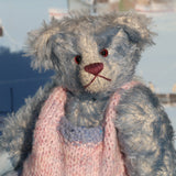 Alice is made from a wonderful soft pale blue mohair, it is fairly long and a little sparse with a paler backcloth which makes her face and expression easier to see, it's not a type of mohair that is made any more which makes her just that little bit extra special. Jasmine has pale blue wool felt paw pads and gorgeous translucent rose coloured glass eyes, she has a splendid, carefully embroidered nose and a relaxed and demure expression.