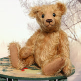 Ambrose is a charming, traditional one of a kind artist bear in German mohair by Barbara Ann Bears, he stands 10 inches/27 cm tall and is 7.5 inches/22 cm sitting. Ambrose is made from beautiful, slightly wavy, warm antique gold German mohair with fawn ultrasuede paw pads and vintage boot buttons for eyes