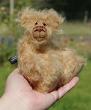 Amos is a very sweet and happy little artist bear by Barbara Ann Bears, he stands just 6.5 inches/16 cm tall and is 5 inches/12 cm sitting. He is made from a very long and fluffy beige mohair with beige wool felt paw pads, hand painted glass eyes with eyelids, a little hand embroidered nose and a beaming smile