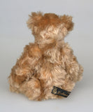 Angus is a very sweet and friendly artist teddy bear in gorgeous mohair by Barbara Ann Bears, he is 7.5 inches/19 cm tall and is 6 inches/15 cm sitting.  Angus is a wonderful traditional teddy bear, a bear we made in the early 1990s, he is made from a grey mohair that has very fine black threads running through it.  Angus has grey wool felt paw pads and gorgeous vintage boot buttons for eyes, he has a little, carefully embroidered black nose and a very relaxed and lovable expression.