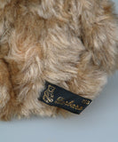 Angus has our original sew in label in his back.