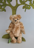 Angus is a very sweet and friendly artist teddy bear in gorgeous mohair by Barbara Ann Bears, he is 7.5 inches/19 cm tall and is 6 inches/15 cm sitting.  Angus is a wonderful traditional teddy bear, a bear we made in the early 1990s, he is made from a grey mohair that has very fine black threads running through it.  Angus has grey wool felt paw pads and gorgeous vintage boot buttons for eyes, he has a little, carefully embroidered black nose and a very relaxed and lovable expression.