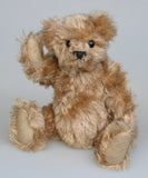 Angus is a very sweet and friendly artist teddy bear in gorgeous mohair by Barbara Ann Bears, he is 7.5 inches/19 cm tall and is 6 inches/15 cm sitting.  Angus is a wonderful traditional teddy bear, a bear we made in the early 1990s, he is made from a grey mohair that has very fine black threads running through it.  Angus has grey wool felt paw pads and gorgeous vintage boot buttons for eyes, he has a little, carefully embroidered black nose and a very relaxed and lovable expression.