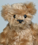 Angus is a very sweet and friendly artist teddy bear in gorgeous mohair by Barbara Ann Bears, he is 7.5 inches/19 cm tall and is 6 inches/15 cm sitting.  Angus is a wonderful traditional teddy bear, a bear we made in the early 1990s, he is made from a grey mohair that has very fine black threads running through it.  Angus has grey wool felt paw pads and gorgeous vintage boot buttons for eyes, he has a little, carefully embroidered black nose and a very relaxed and lovable expression.
