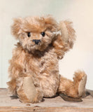 Angus is a very sweet and friendly artist teddy bear in gorgeous mohair by Barbara Ann Bears, he is 7.5 inches/19 cm tall and is 6 inches/15 cm sitting.  Angus is a wonderful traditional teddy bear, a bear we made in the early 1990s, he is made from a grey mohair that has very fine black threads running through it.  Angus has grey wool felt paw pads and gorgeous vintage boot buttons for eyes, he has a little, carefully embroidered black nose and a very relaxed and lovable expression.