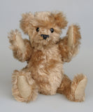 Angus is a very sweet and friendly artist teddy bear in gorgeous mohair by Barbara Ann Bears, he is 7.5 inches/19 cm tall and is 6 inches/15 cm sitting.  Angus is a wonderful traditional teddy bear, a bear we made in the early 1990s, he is made from a grey mohair that has very fine black threads running through it.  Angus has grey wool felt paw pads and gorgeous vintage boot buttons for eyes, he has a little, carefully embroidered black nose and a very relaxed and lovable expression.