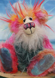Anoushka Flambé a joyous celebration of colourful happiness, a one of a kind artist bear in hand dyed mohair & faux fur by Barbara-Ann Bears. Anoushka Flambé stands 10 inches( 25 cm) tall and is 7.5 inches ( 19 cm) sitting, this doesn't include her flaming hair which adds another 2.5 inches (7cm).