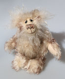 Arthur is an endearingly sweet one of a kind, artist bear by Barbara-Ann Bears in wonderfully fluffy mohair and faux fur. Arthur stands 8 inches (20 cm) tall and is 6 inches (15 cm) sitting.
