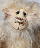 Arthur is an endearingly sweet one of a kind, artist bear by Barbara-Ann Bears in wonderfully fluffy mohair and faux fur. Arthur stands 8 inches (20 cm) tall and is 6 inches (15 cm) sitting.