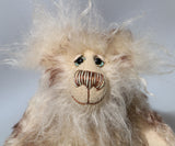 Arthur is an endearingly sweet one of a kind, artist bear by Barbara-Ann Bears in wonderfully fluffy mohair and faux fur. Arthur stands 8 inches (20 cm) tall and is 6 inches (15 cm) sitting.
