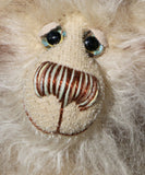 Arthur is an endearingly sweet one of a kind, artist bear by Barbara-Ann Bears in wonderfully fluffy mohair and faux fur. Arthur stands 8 inches (20 cm) tall and is 6 inches (15 cm) sitting.