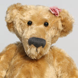 Bernadette is made from a beautiful, slightly distressed, soft fawn coloured English mohair, we used to love using English mohair, it had such a strong texture, it was made using looms dating back to the early 1900s, she has black, glass, spherical eyes, these catch the light from any angle so she always has a cheeky twinkle in her eye. Bernadette has quite a large, neatly sewn nose and a sweet smile