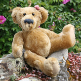 Bernadette is one of our very old bears, she's a sweet and cuddly, traditional teddy bear made from gorgeous English mohair by Barbara Ann Bears, she is 12 inches/30cm tall and is 9 inches/23cm sitting. Bernadette is made from a beautiful, slightly distressed, soft fawn English mohair, with beige wool felt paw pads