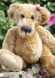 Bernadette is one of our very old bears, she's a sweet and cuddly, traditional teddy bear made from gorgeous English mohair by Barbara Ann Bears, she is 12 inches/30cm tall and is 9 inches/23cm sitting. Bernadette is made from a beautiful, slightly distressed, soft fawn English mohair, with beige wool felt paw pads