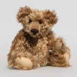 Bernard McFluff is a very old bear, he was one of our first designs going back to 1992. He is 12 inches/30cm tall and is 9 inches/23cm sitting Bernard McFluff is made from a beautiful, distressed, shaggy, soft brown English mohair, he was one of our first bears with a long snout and a big tummy