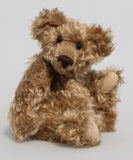 Bernard McFluff is a very old bear, he was one of our first designs going back to 1992. He is 12 inches/30cm tall and is 9 inches/23cm sitting Bernard McFluff is made from a beautiful, distressed, shaggy, soft brown English mohair, he was one of our first bears with a long snout and a big tummy