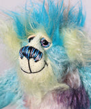 Bim-Bam has beautiful, hand painted eyes with eyelids, a splendid nose embroidered from individual threads to compliment his colouring and he has a sweet, friendly smile.