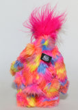 Bing-Bong is a colourful, fun-loving and comical, one of a kind, artist bear by Barbara-Ann Bears in luxurious mohair and rather wild faux fur, he stands 13 inches (33 cm) tall and is 10.5 inches (27 cm) sitting. He is mostly made from a multicoloured faux fur, it has patches of magenta, orange, yellow, blue and violet