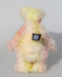 Blossom is a sweet and gently colourful, one of a kind mohair artist bear by Barbara-Ann Bears, she stands 10 inches/25 cm tall and is 8 inches/20 cm sitting. Blossom is made from medium length wildly curly mohair that Barbara has hand dyed a soft primrose yellow and delicate pink with matching hand dyed velvet paw pads
